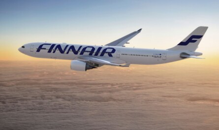 Finnair's Airbus 330 flying above Helsinki